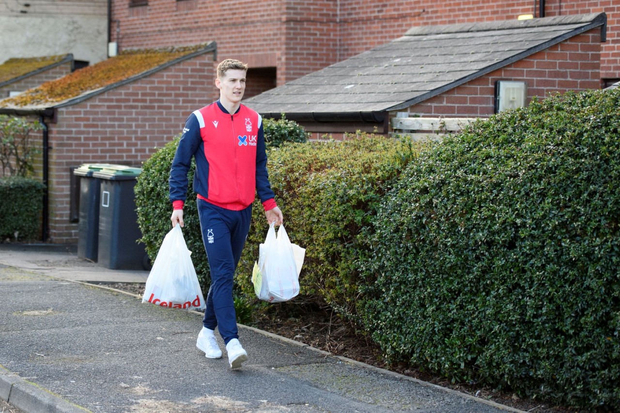 thumbnail_Ryan Yates delivering the EFL's one millionth food parcel.jpg